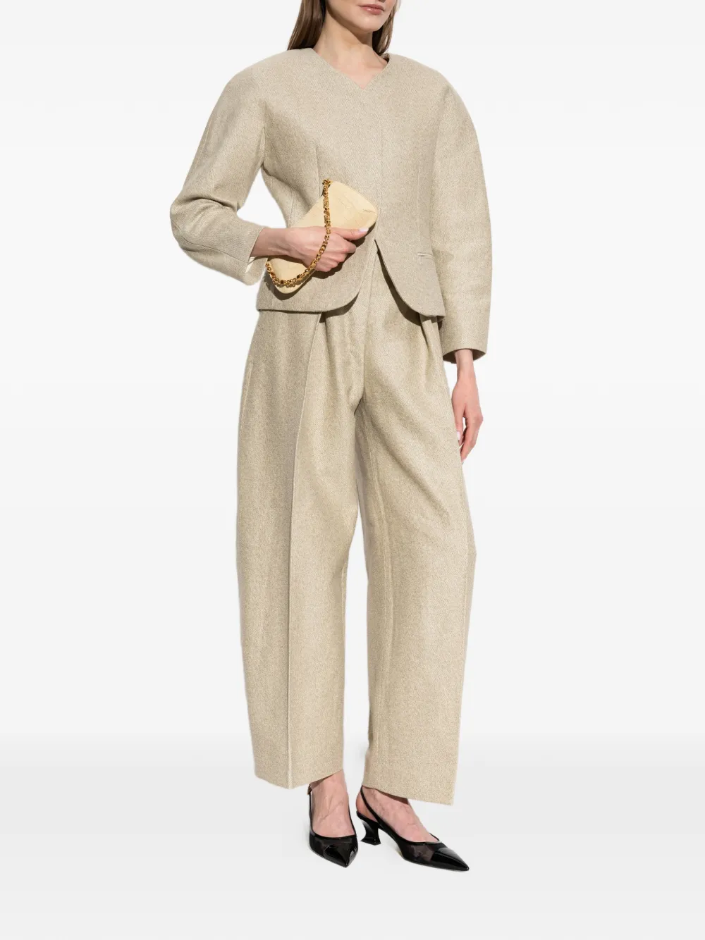 Jacquemus The Ovalo gewelfde broek Beige