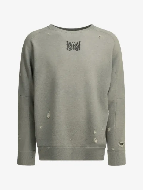 Needles sweatshirt med sommerfugletryk og slitageeffekt