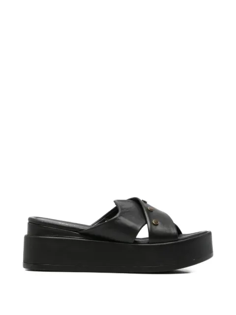 SERGIO MORETTI FIRENZE Mule com tiras cruzadas e tachas