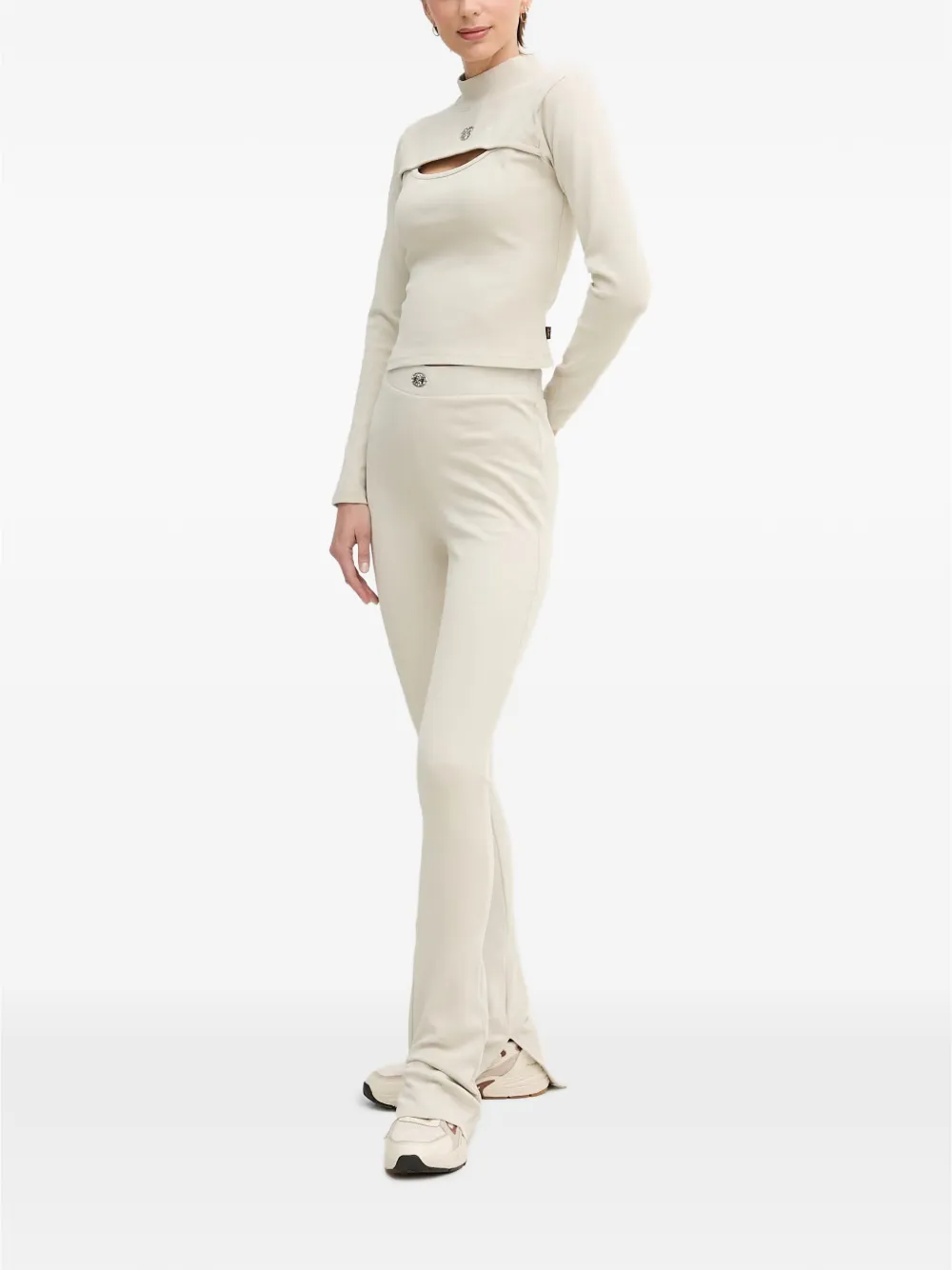 Alpha Industries Flared broek met logoplakkaat en split bij de zoom Wit