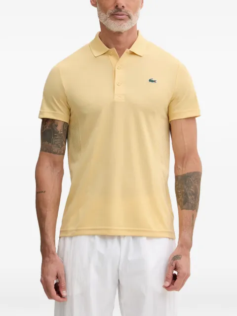 Lacoste playera tipo polo con parche del logo en colaboración con Novak Djokovic
