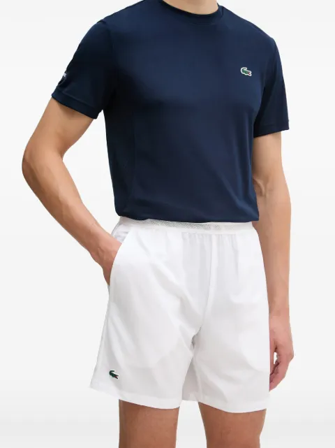 Lacoste shorts con parche del logo