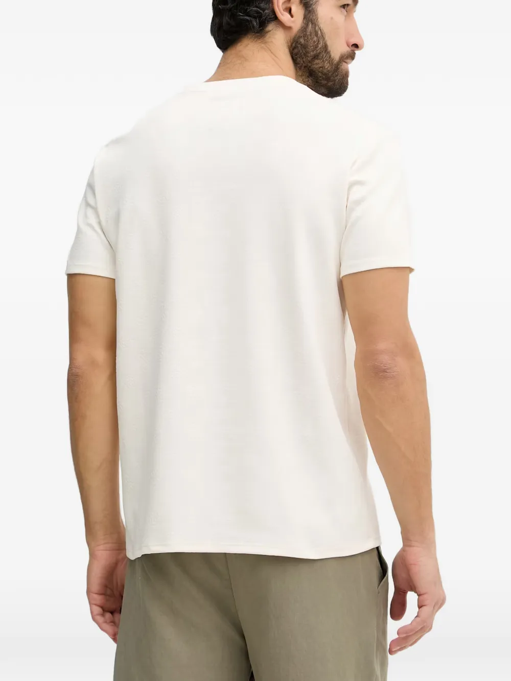 GUESS USA T-shirt met logo-reliëf Beige
