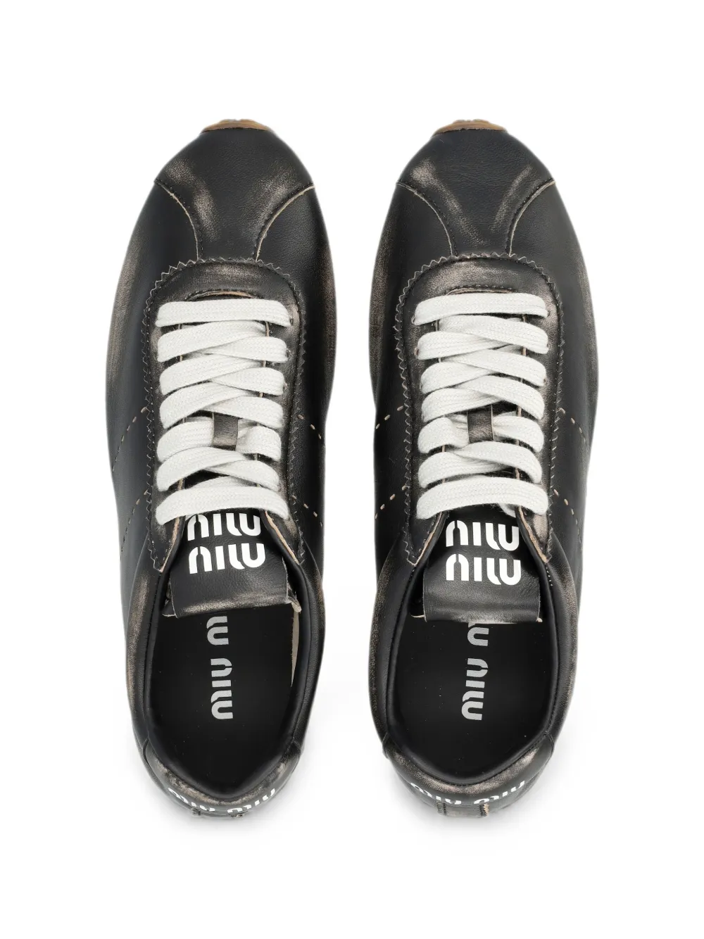 Miu distressed leather sneakers Zwart