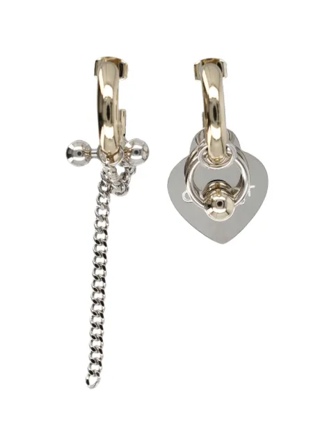 Justine Clenquet pendientes Nick asimétricos con charm de corazón