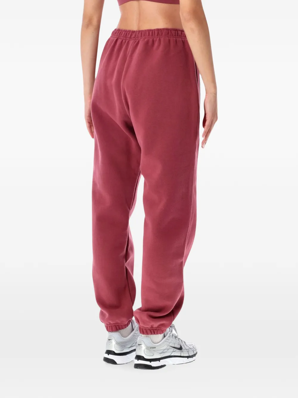 Nike Medium Studio fleece high-waist oversized broek met omgeslagen pijpen Roze