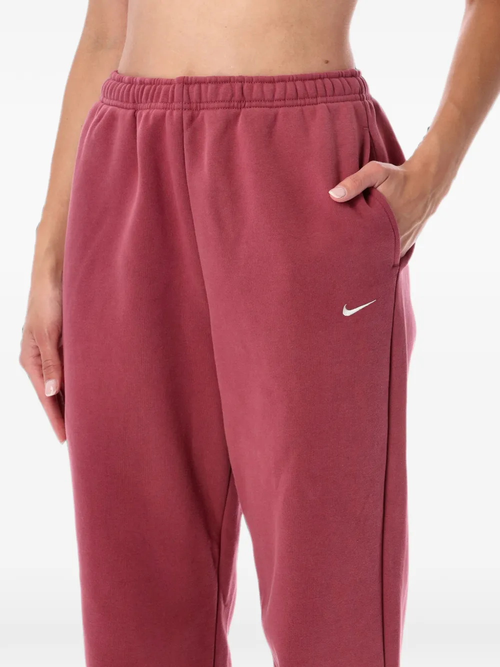 Nike Medium Studio fleece high-waist oversized broek met omgeslagen pijpen Roze