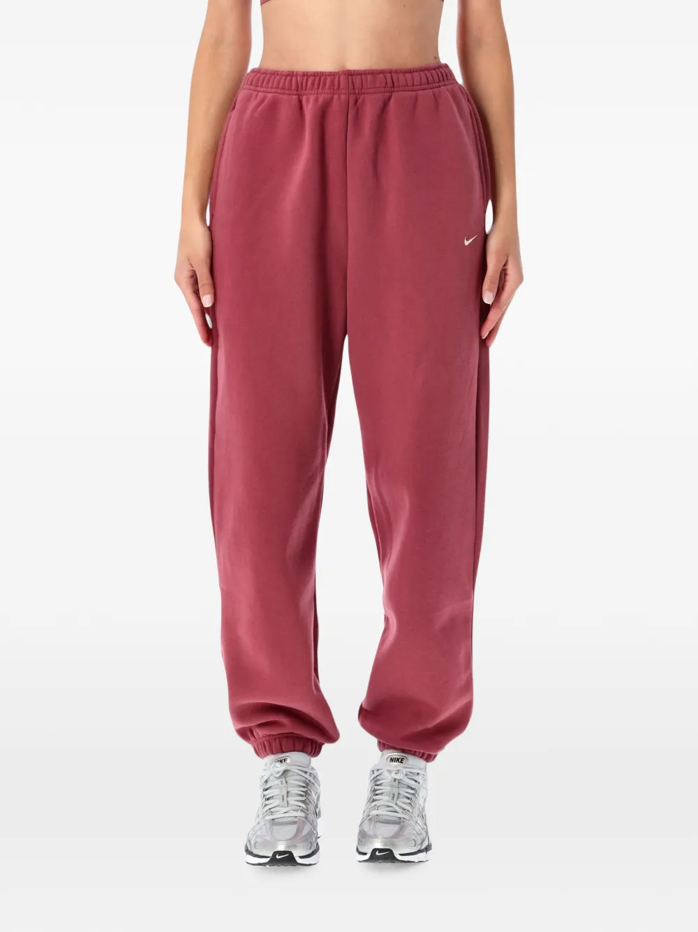 Nike Medium Studio fleece high-waist oversized broek met omgeslagen pijpen Roze