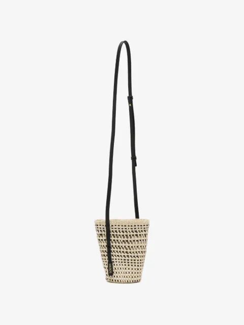 Braid pocket in iraca palm and calfskin bag