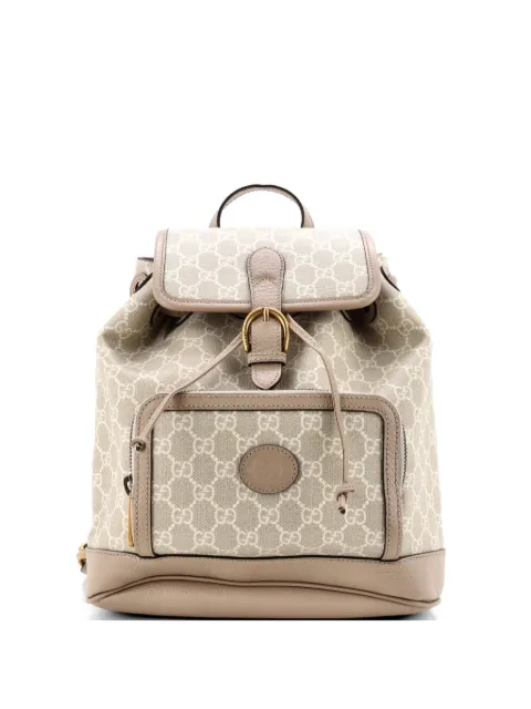 Gucci Pre-Owned mochila pequeña de lona GG revestida con parche G entrelazado con cordones y solapa