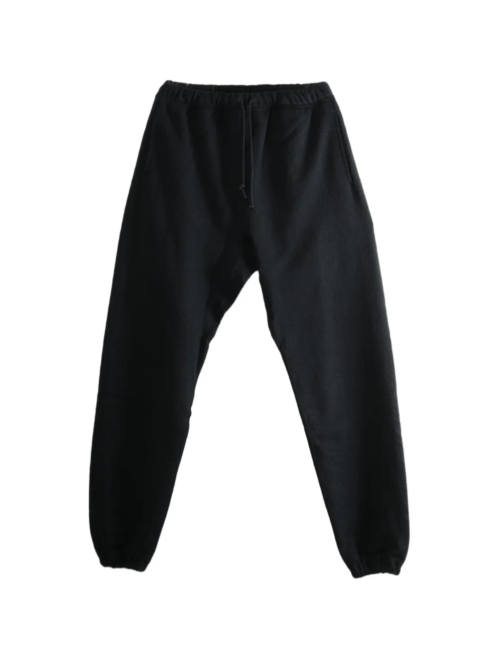 MONONOKE MADE sunflower-print track pants - Nero