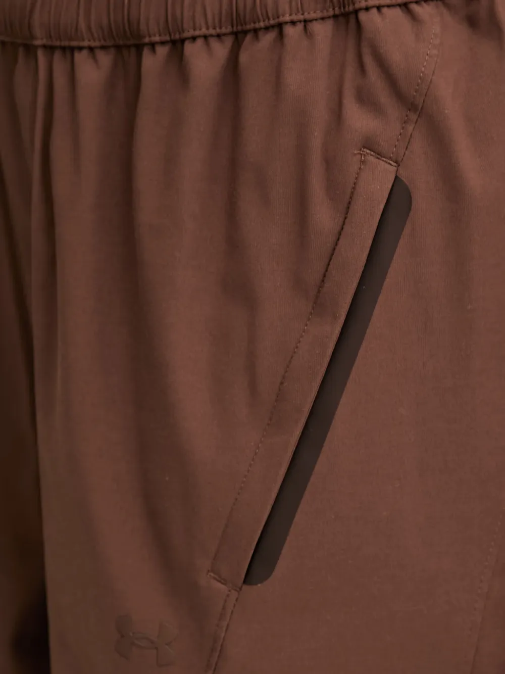 Under Armour Unstoppable geweven trainingsbroek met elastische tailleband en logo-patch Bruin