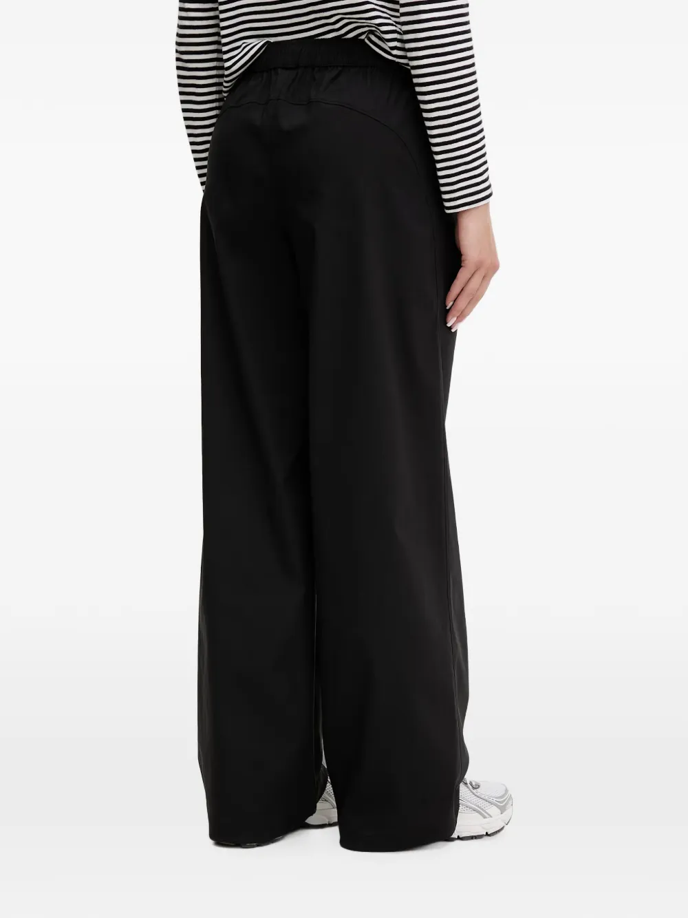 Under Armour Unstoppable Woven trainingsbroek met wijde pijpen en logo-print Zwart