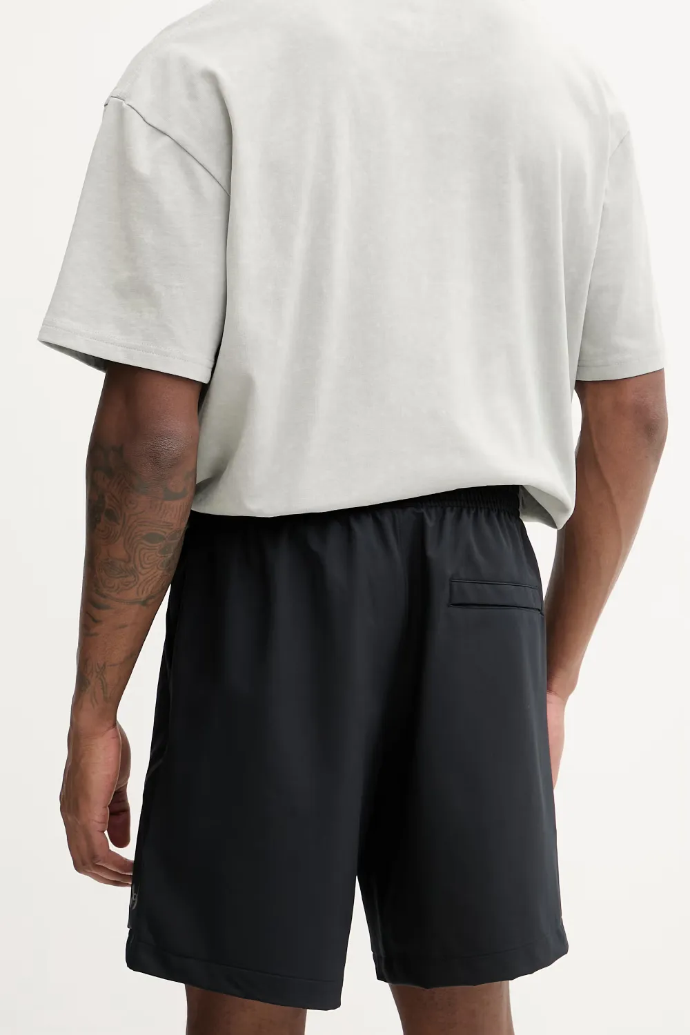 Under Armour Unstoppable Woven shorts met elastische taille en logo-print Zwart