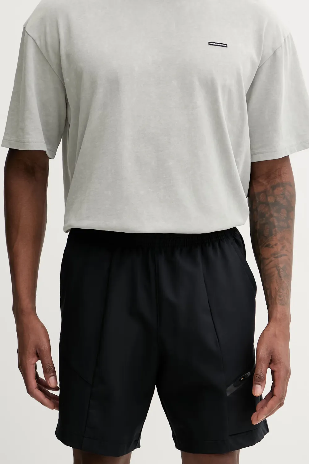 Under Armour Unstoppable Woven shorts met elastische taille en logo-print Zwart