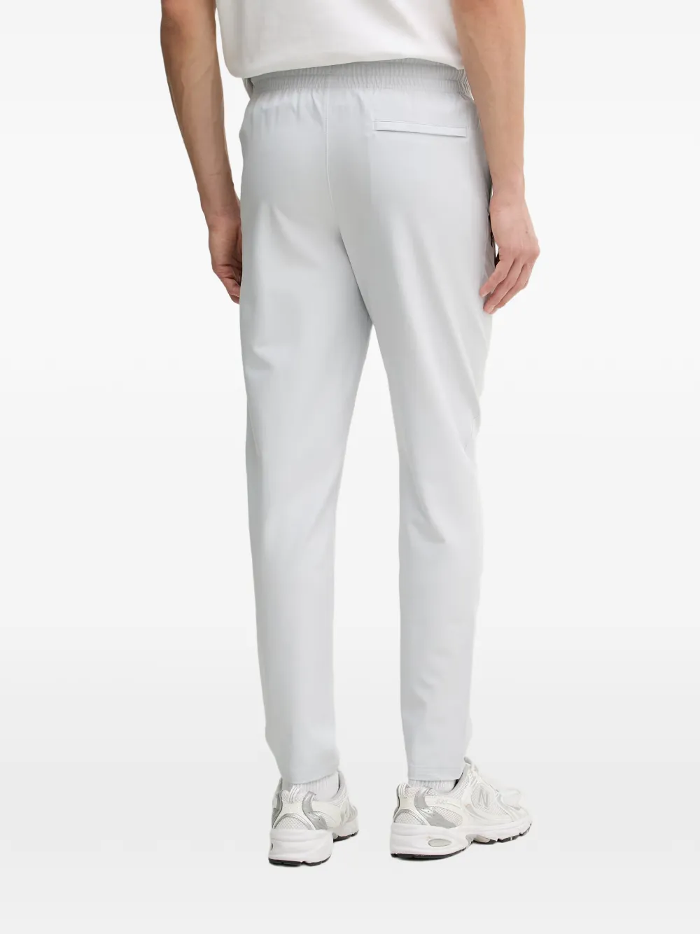 Under Armour UA Unstoppable broek met elastische tailleband en logo-patch Grijs