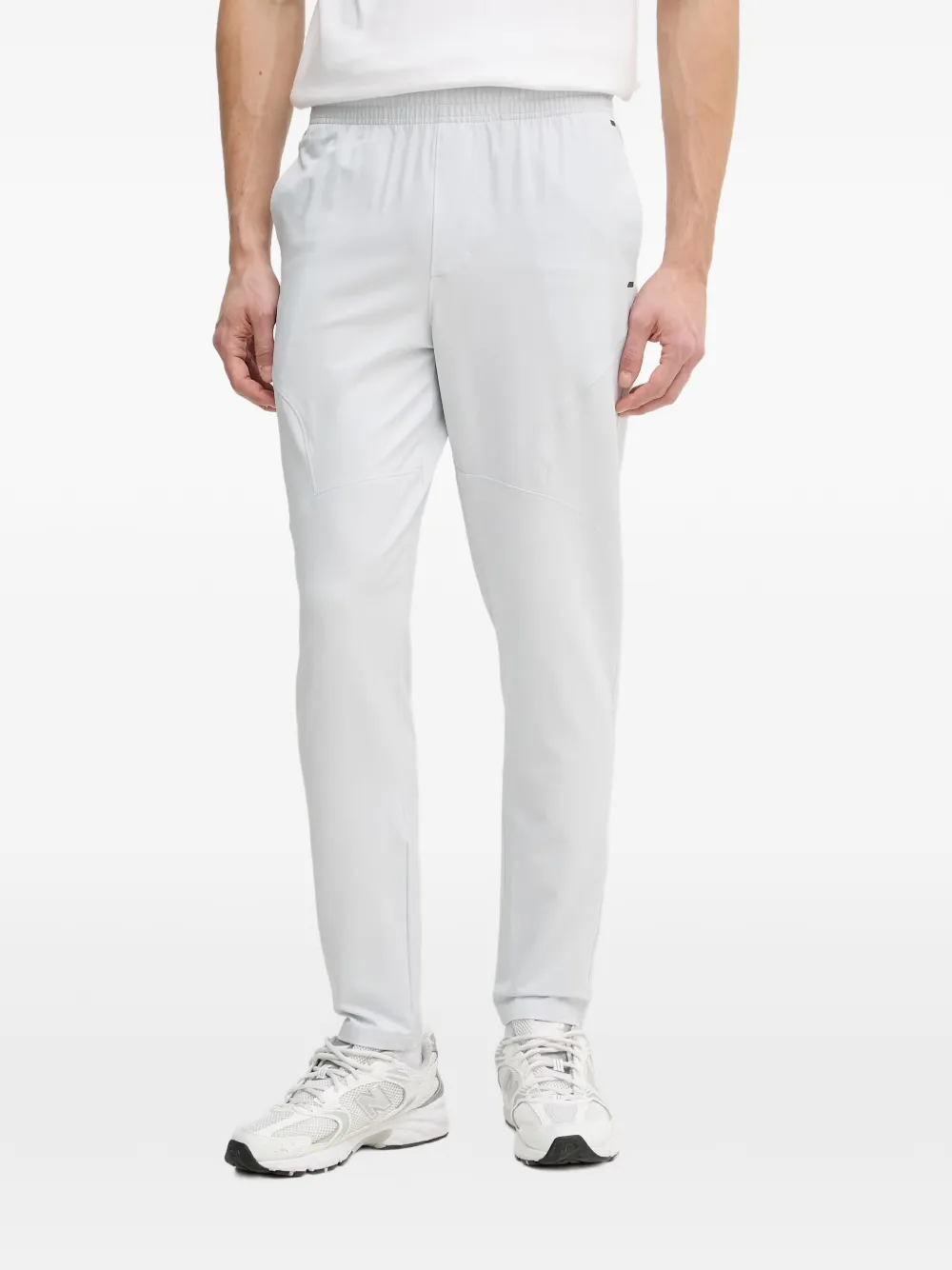 Under Armour UA Unstoppable logo-patch elasticated-waistband trousers - Grau