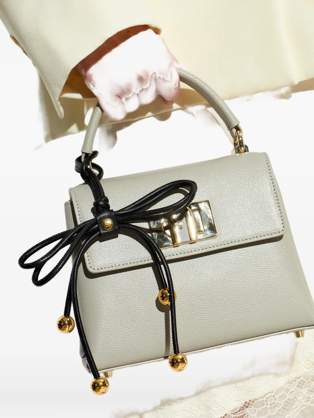 Furla Poppy leren tas met strikdetail Zwart