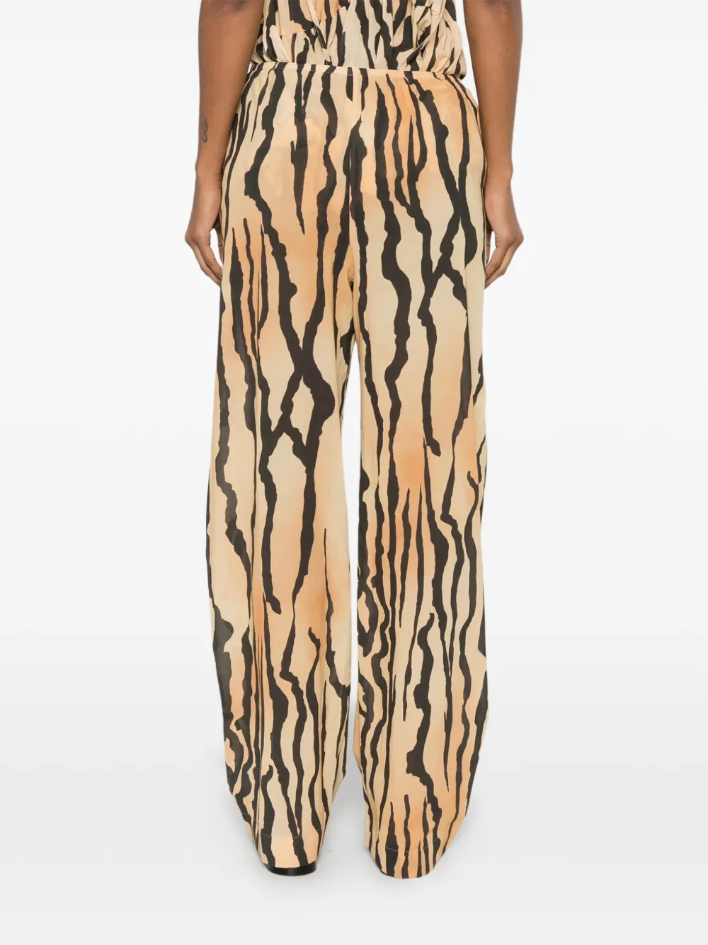 Nanushka Zoela broek met wijde pijpen en tijgerprint Oranje