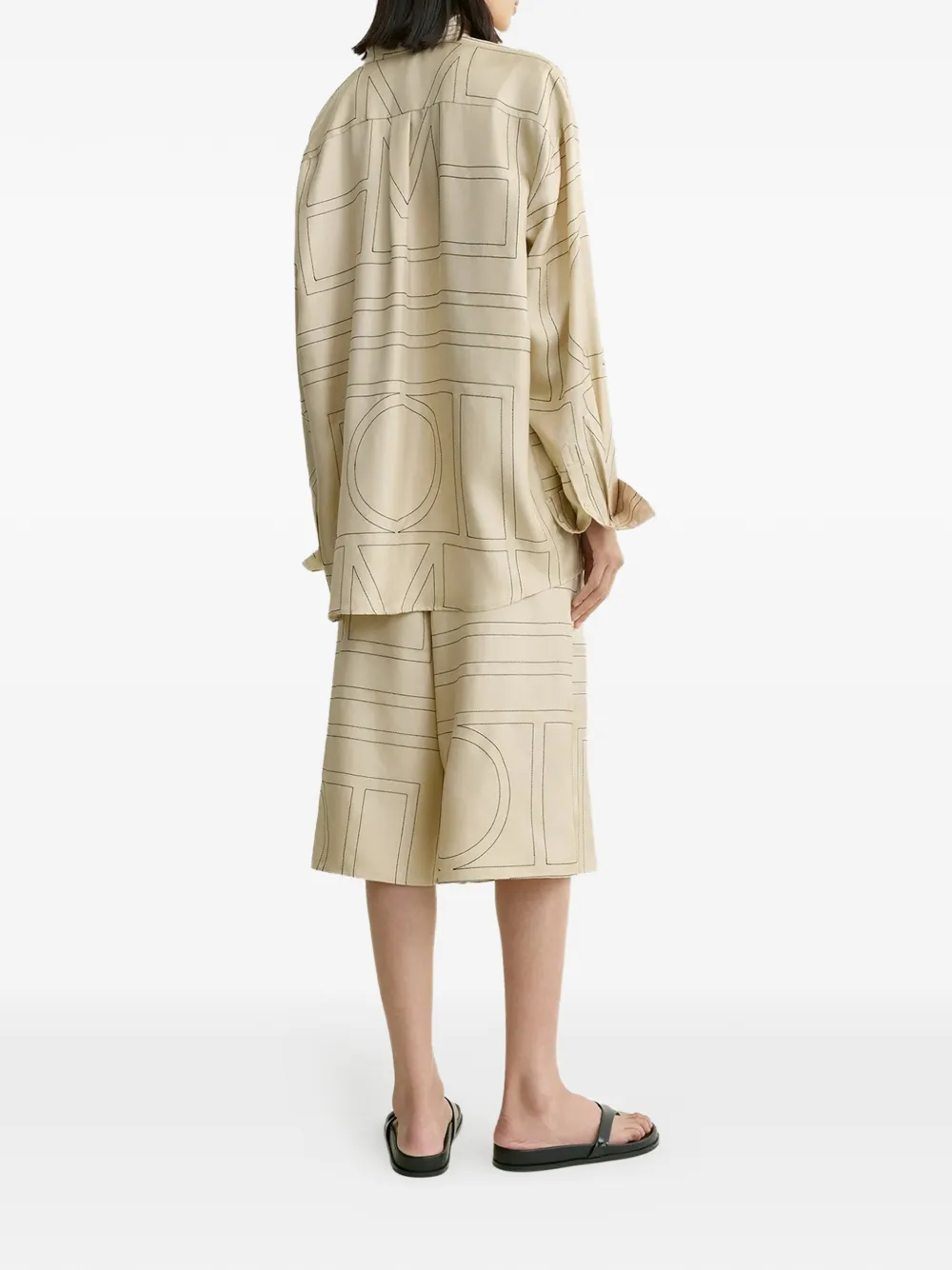 TOTEME Zijden blouse met monogramprint Beige
