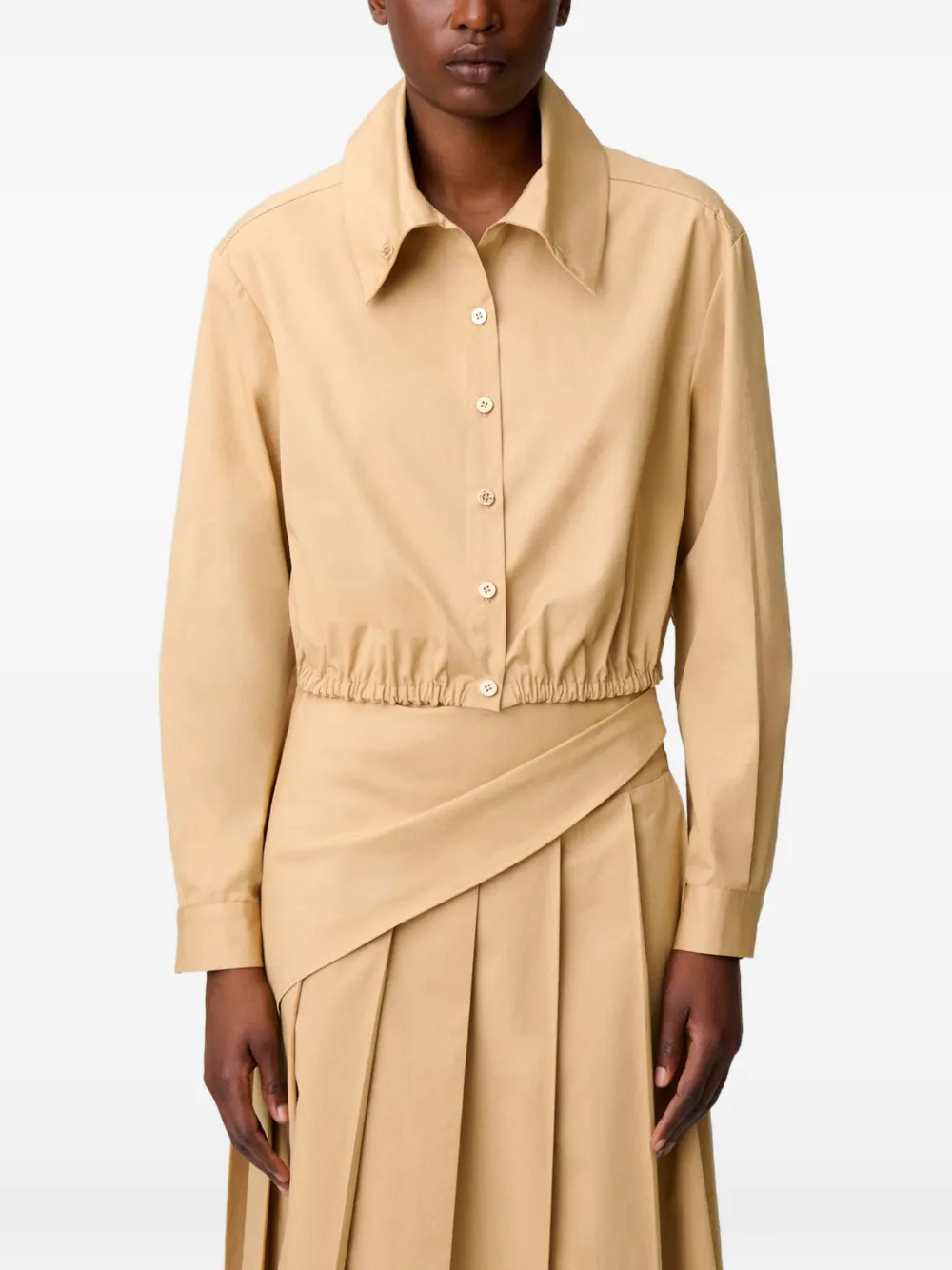 Claudie Pierlot Cropped blouse met hoge hals Beige