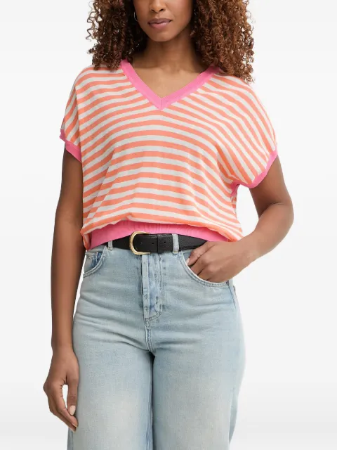 Lola Casademunt — striped V-neck sweater