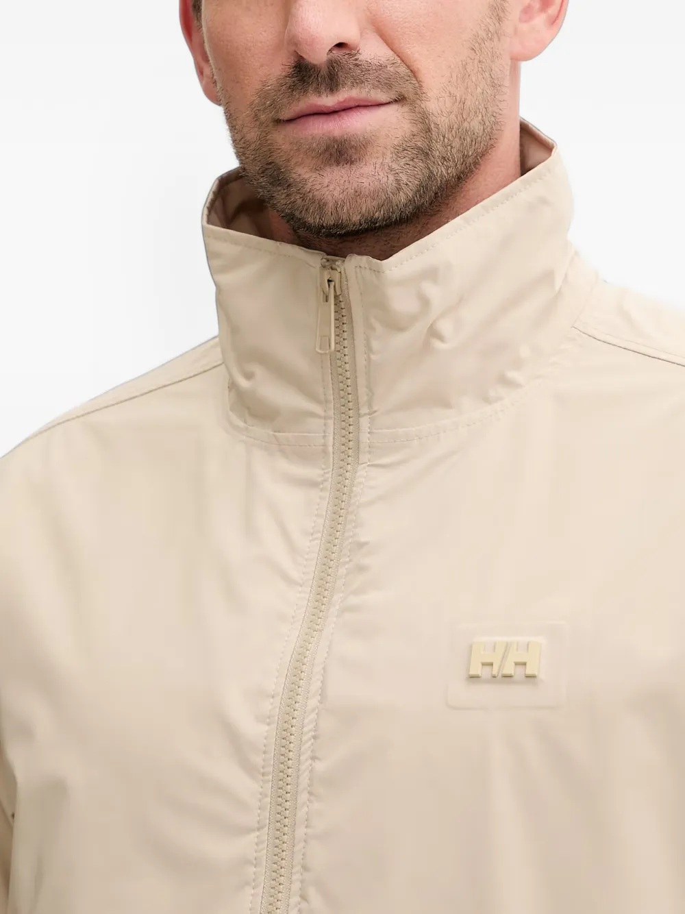 Helly Hansen Vika jack met logo-plakkaat en rits Beige