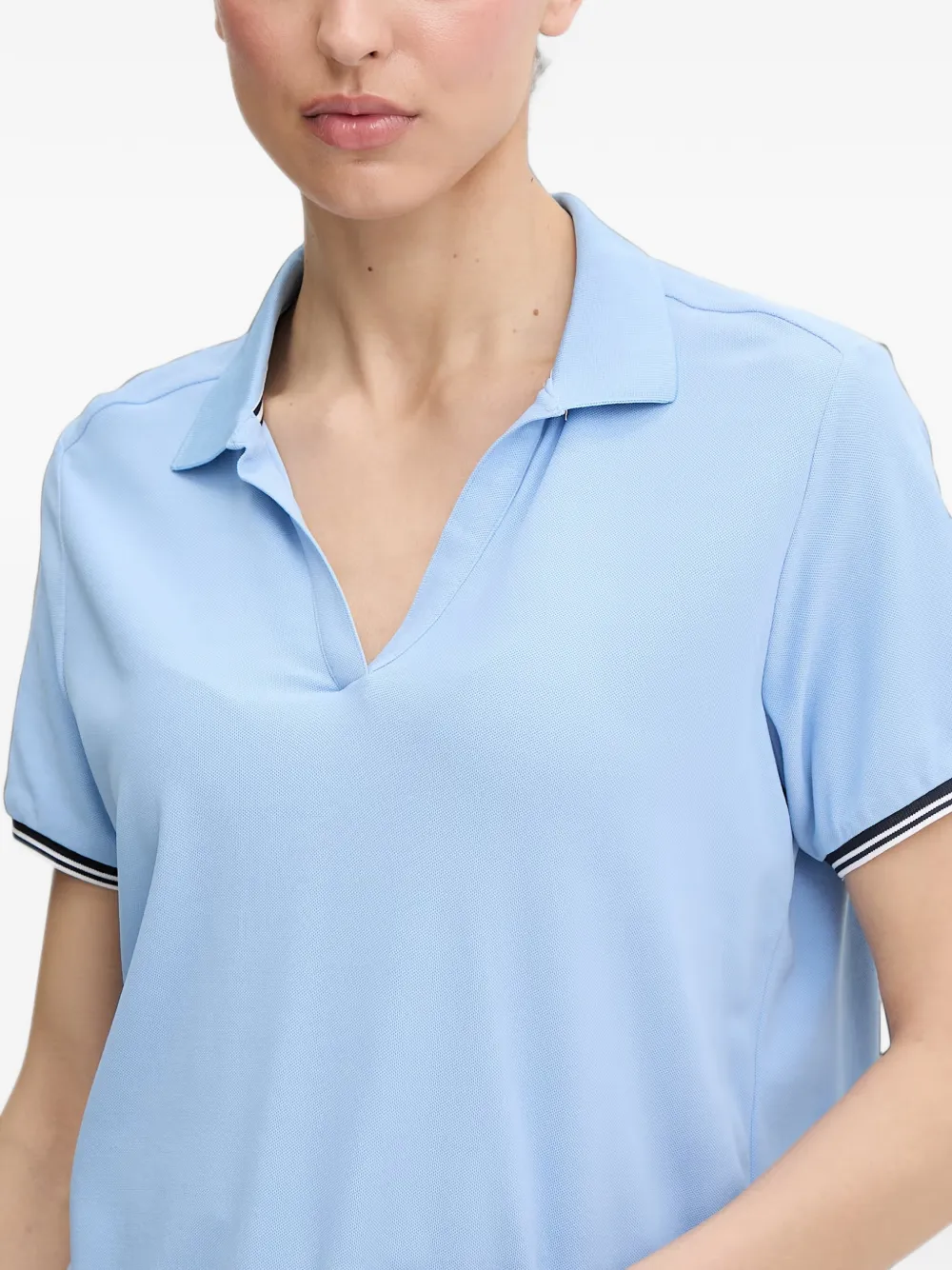 Helly Hansen Poloshirt met V-hals en gestreepte afwerking Blauw