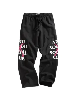 A BATHING APE® シャークヘッド トラックパンツ | ブラック | FARFETCH JP