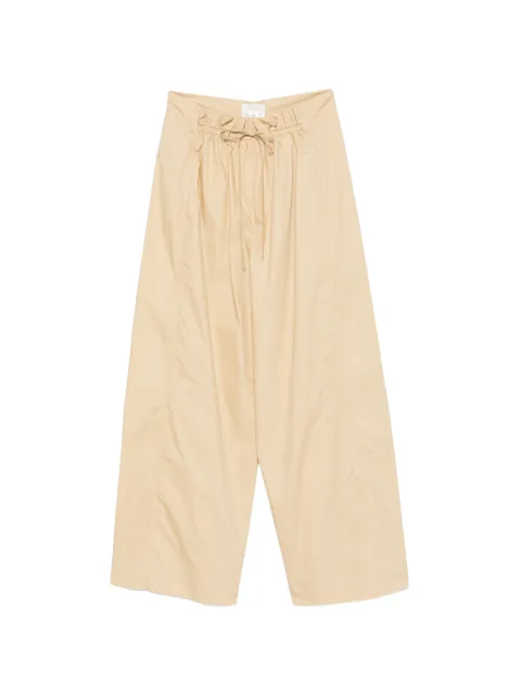 Tela pantalones con cordones en la pretina