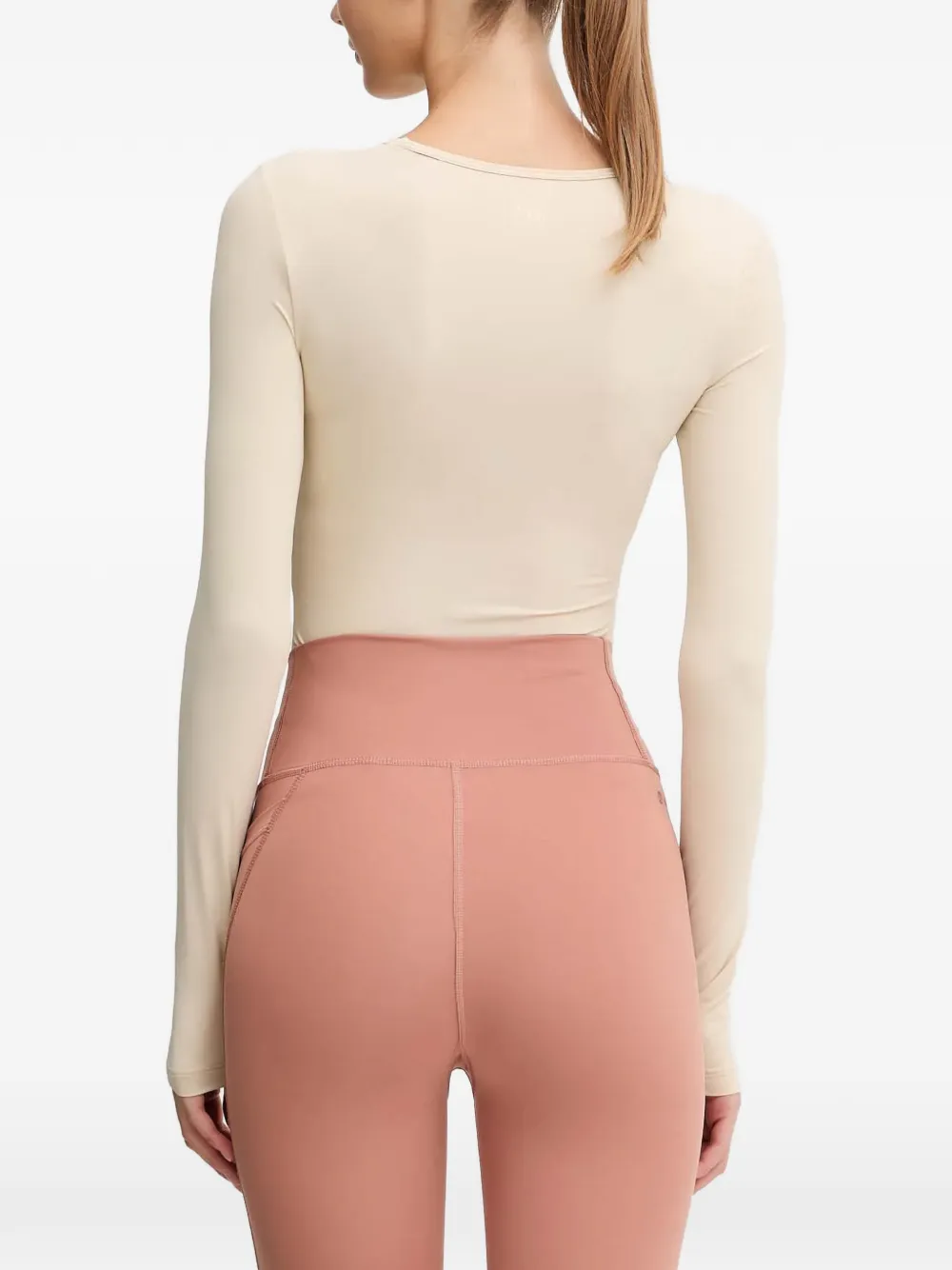 Casall cut-out long-sleeved bodysuit Beige