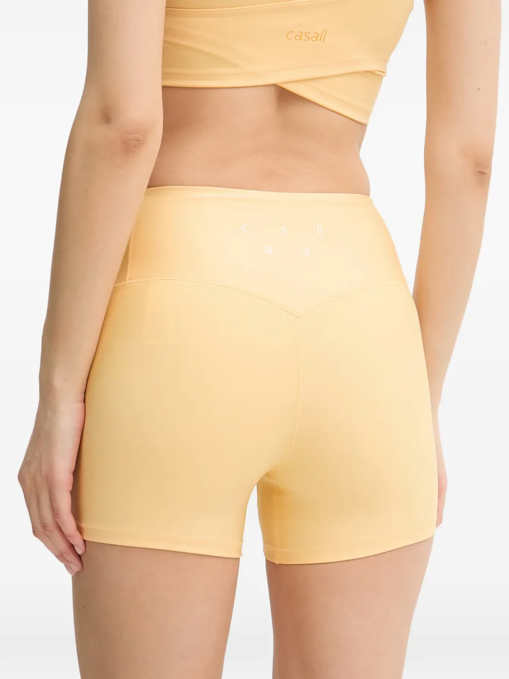 Casall High waist shorts met logoprint Geel