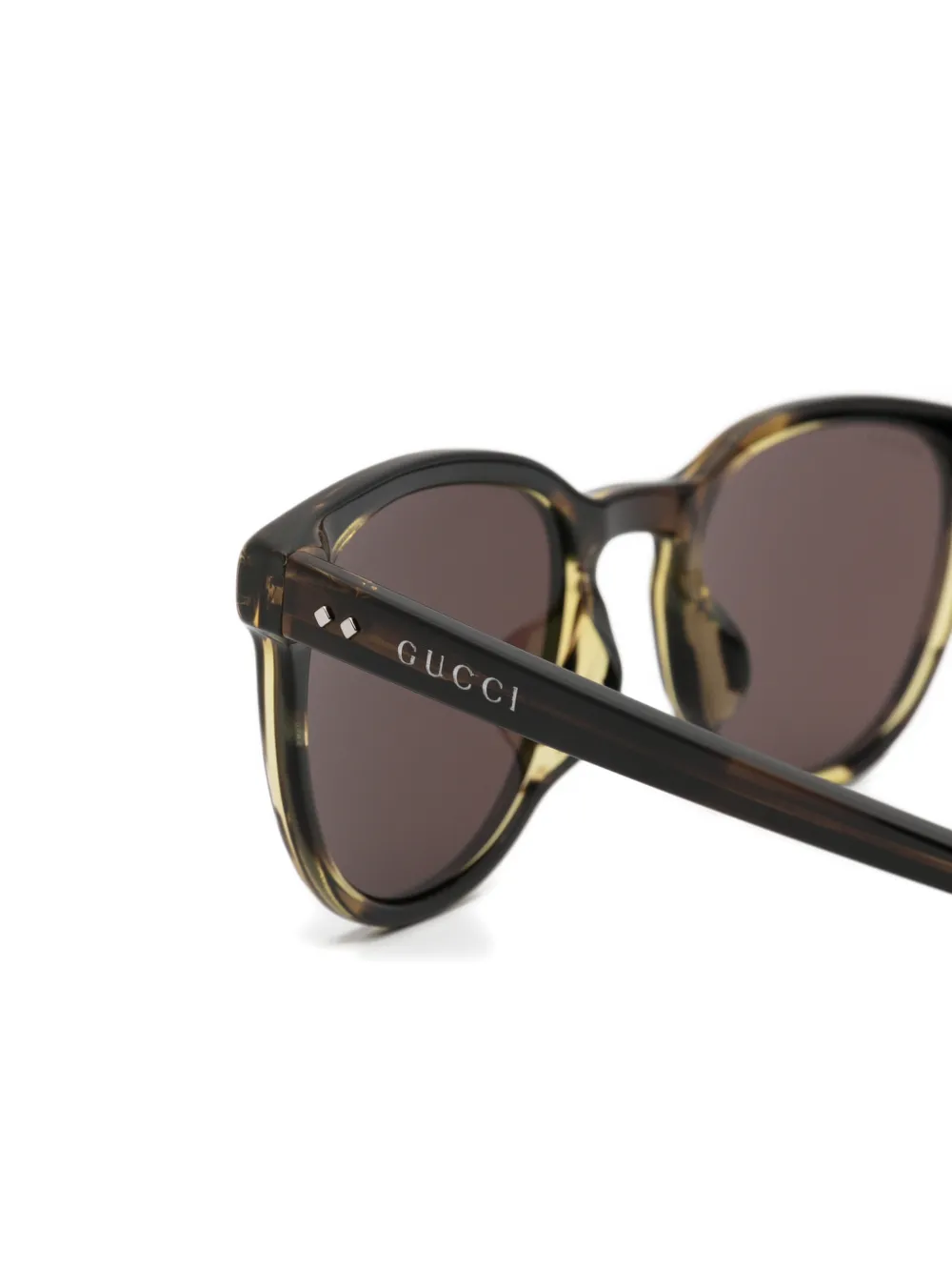 Gucci Eyewear Zonnebril met rond montuur Bruin