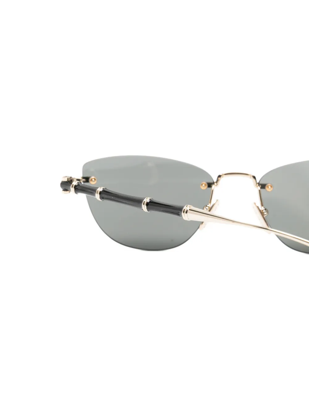 Gucci Eyewear Bamboo zonnebril met randloos cat-eye montuur Goud
