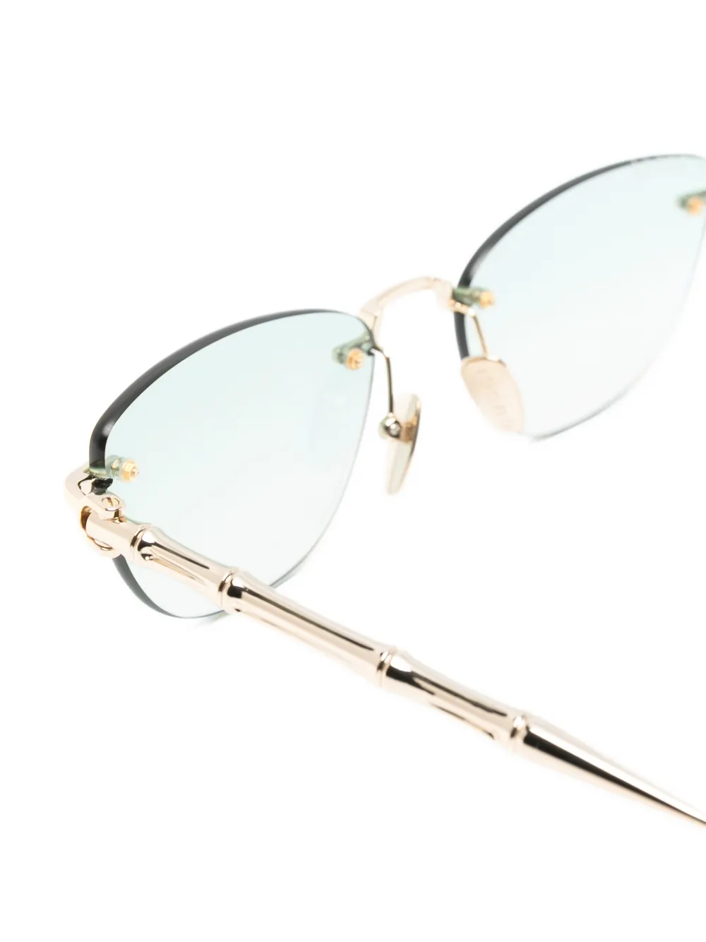 Gucci Eyewear Bamboo zonnebril met randloos cat-eye montuur Goud