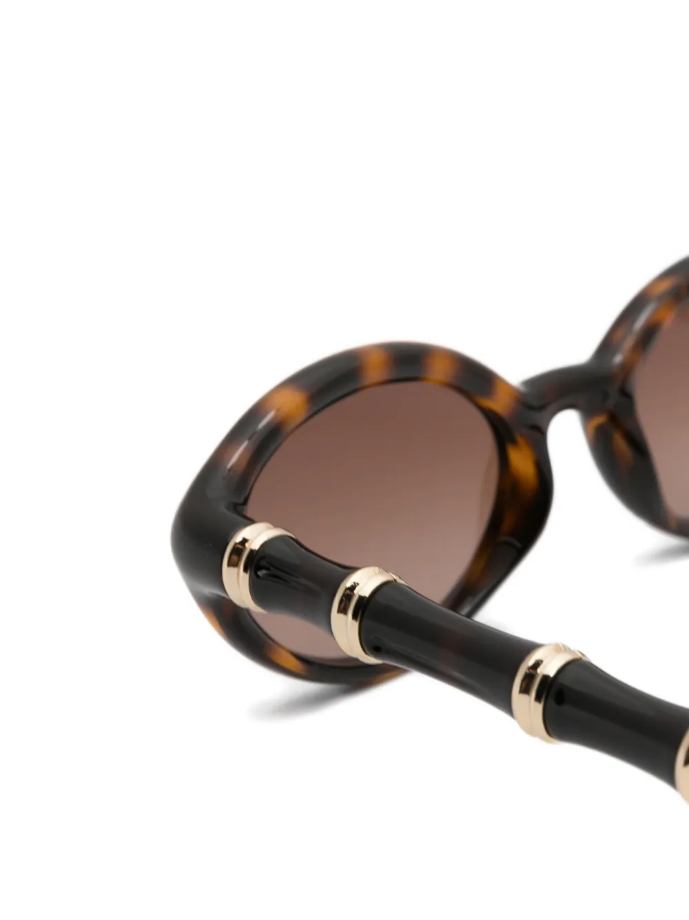 Gucci Eyewear Zonnebril met ovalen montuur en bamboe-effect Bruin