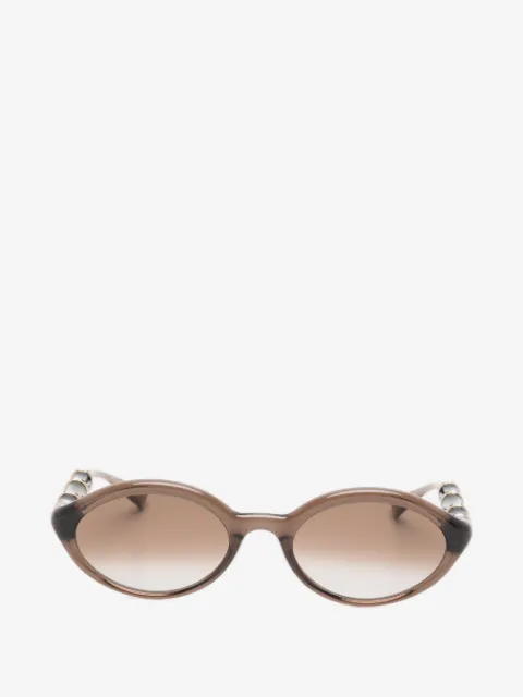 Gucci Eyewear lunettes de soleil à monture géométrique
