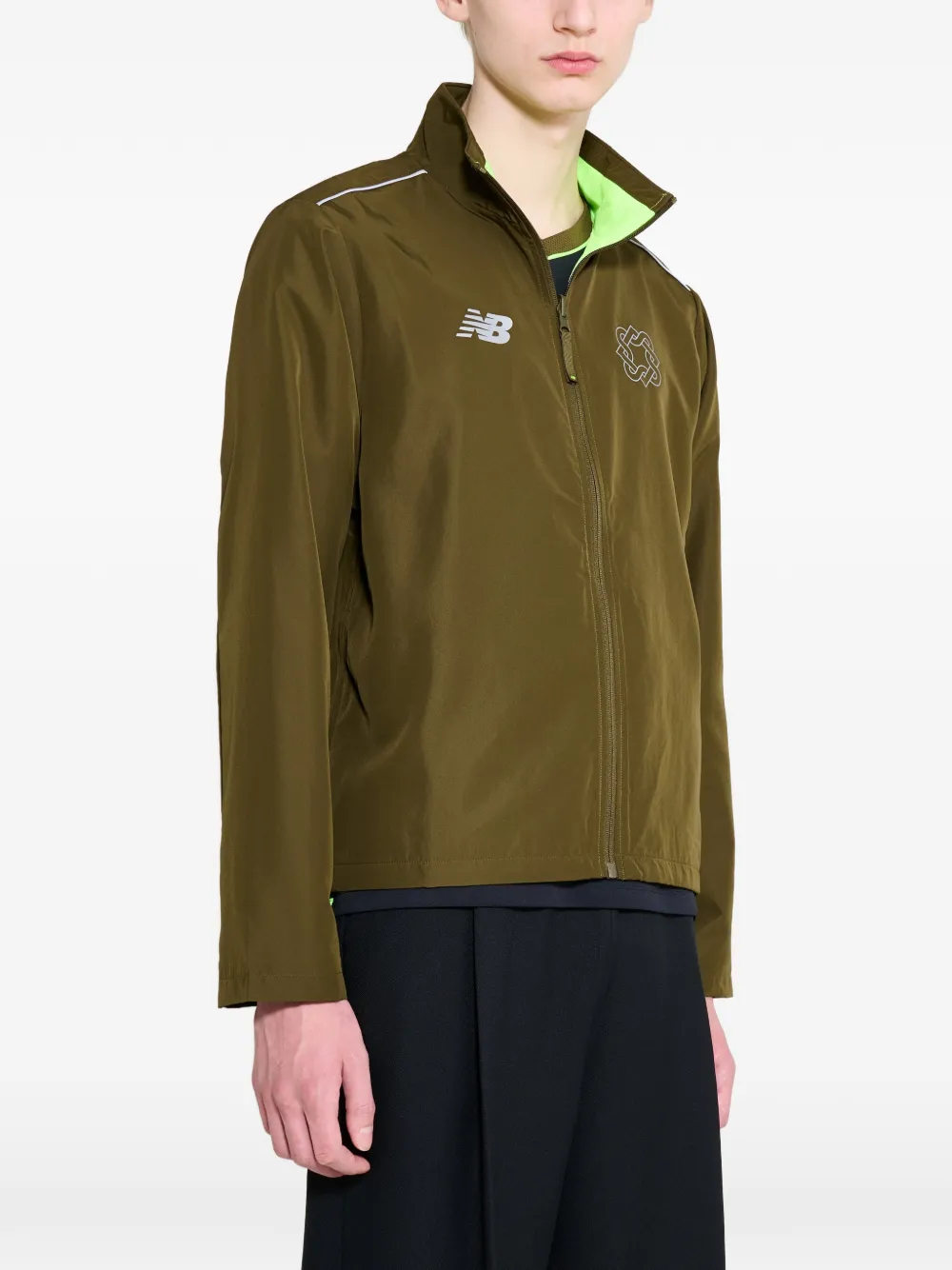 New Balance Lack of Guidance omkeerbaar jack met logoprint Groen