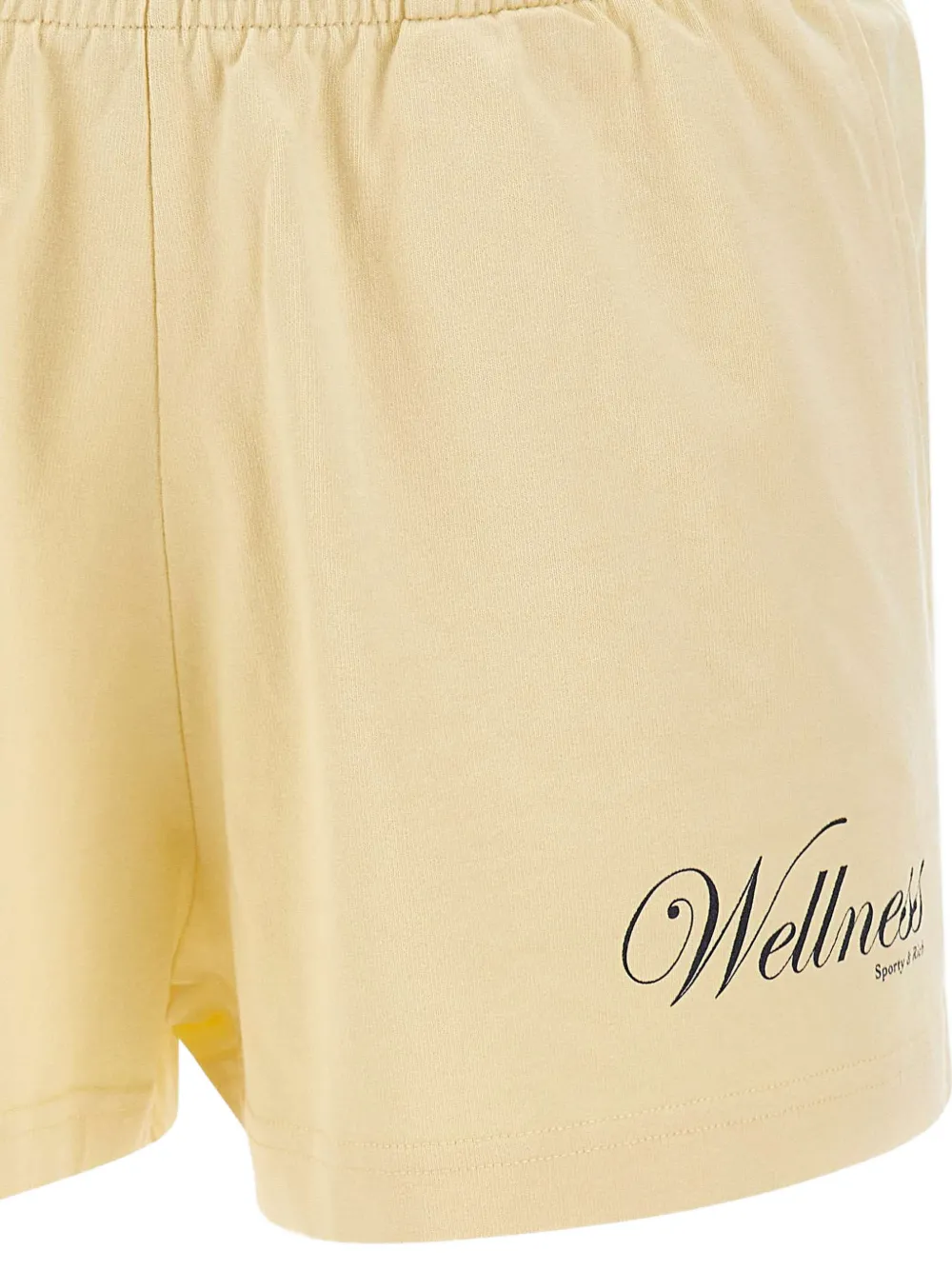 Sporty & Rich Avenue Disco shorts met elastische taille Beige