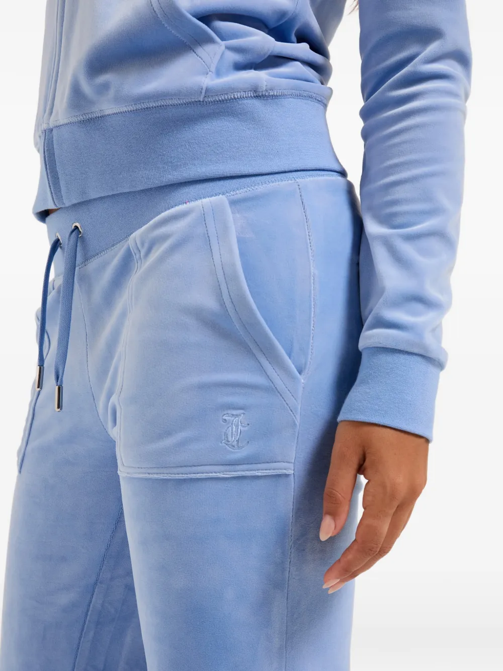 Juicy Couture Flared trainingsbroek met fluwelen textuur Blauw