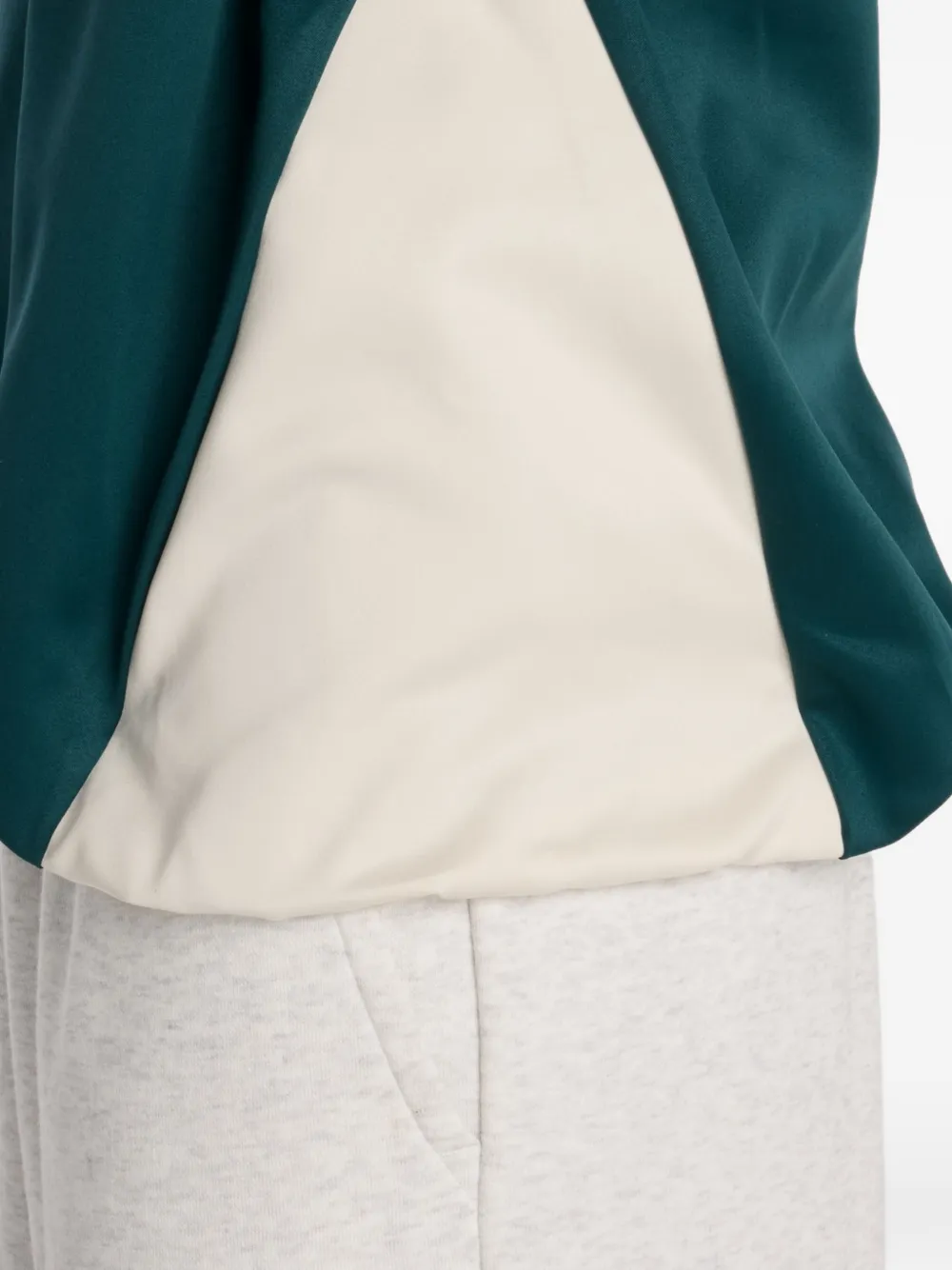 New Balance Geweven satijnen sweater Groen
