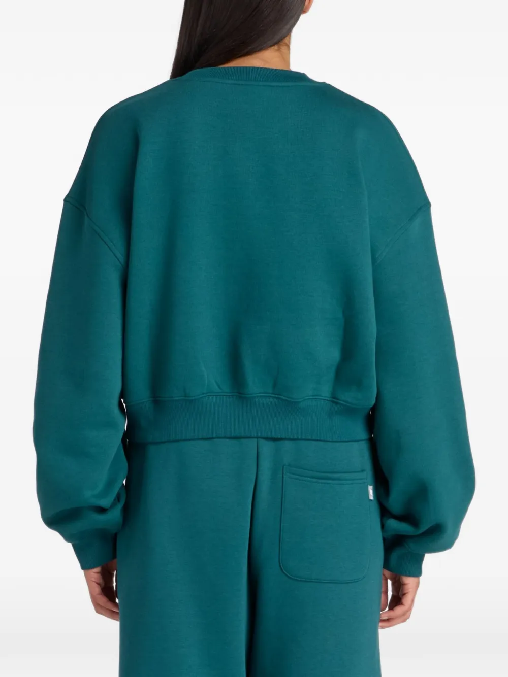 New Balance Trackside fleece sweater Groen