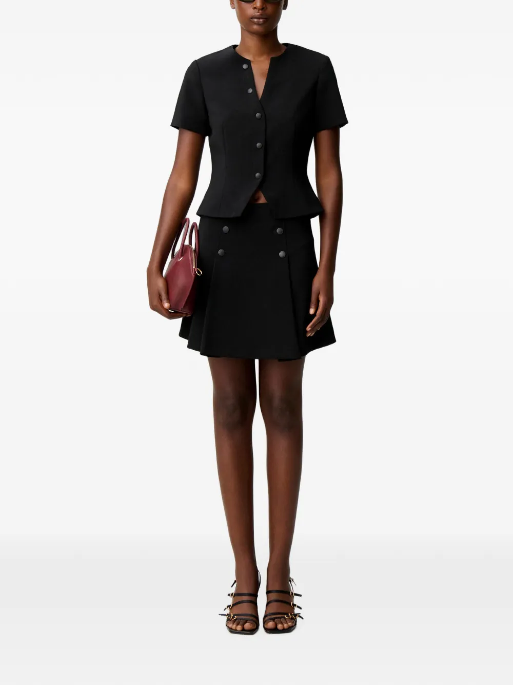 Claudie Pierlot Getailleerde top met V-hals en knopen Zwart