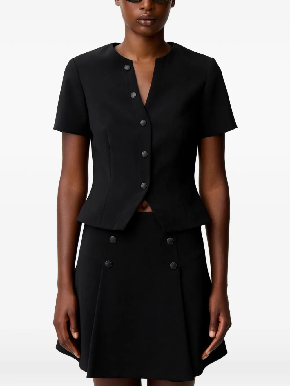 Claudie Pierlot Getailleerde top met V-hals en knopen Zwart