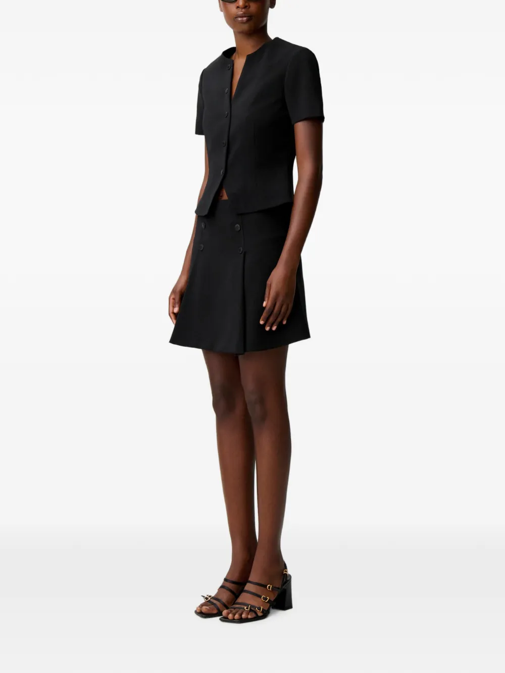 Claudie Pierlot Getailleerde top met V-hals en knopen Zwart