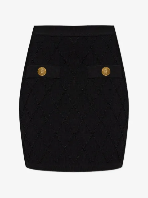 Balmain falda corta con cabeza de león y capitonado de rombos