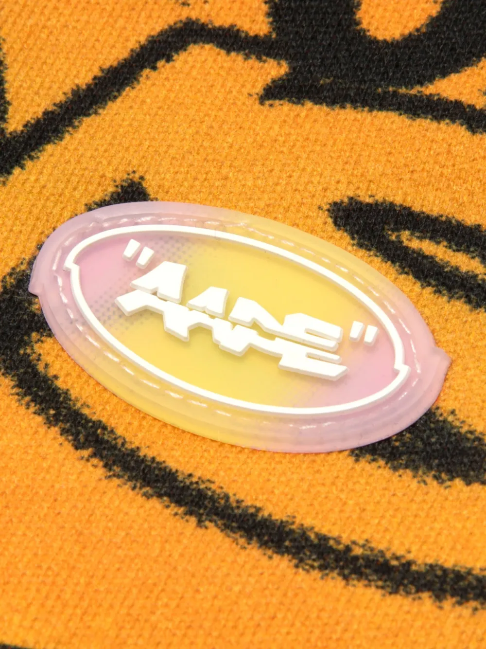 AAPE BY *A BATHING APE Shorts met graffiti-print Oranje