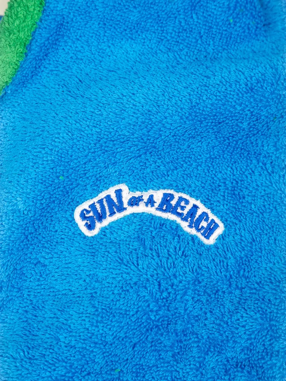 SUN of a BEACH Poncho met capuchon en logopatch Blauw
