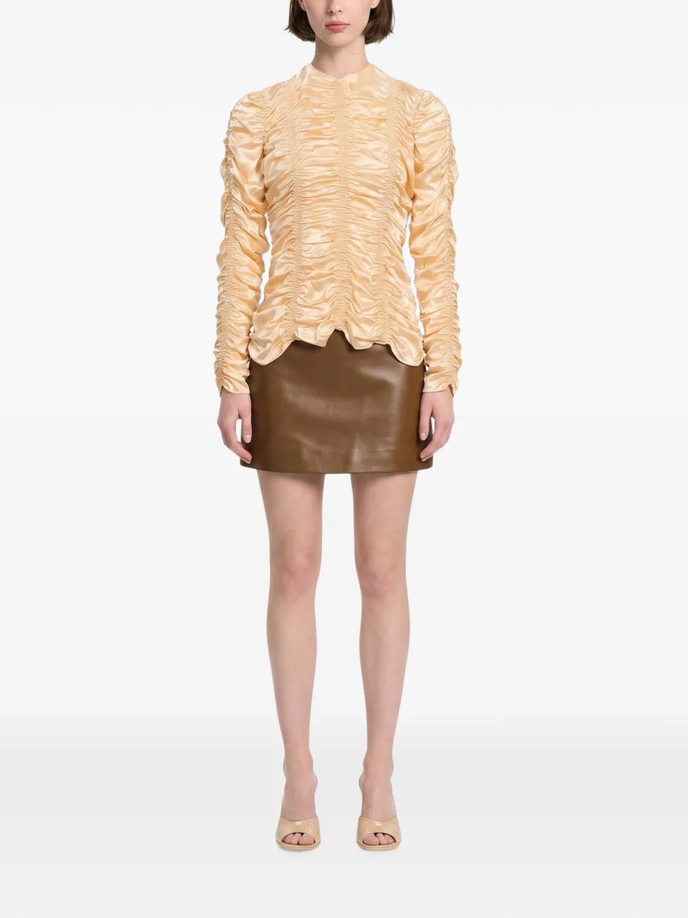 KHAITE Rory blouse met ruches en lange mouwen Geel