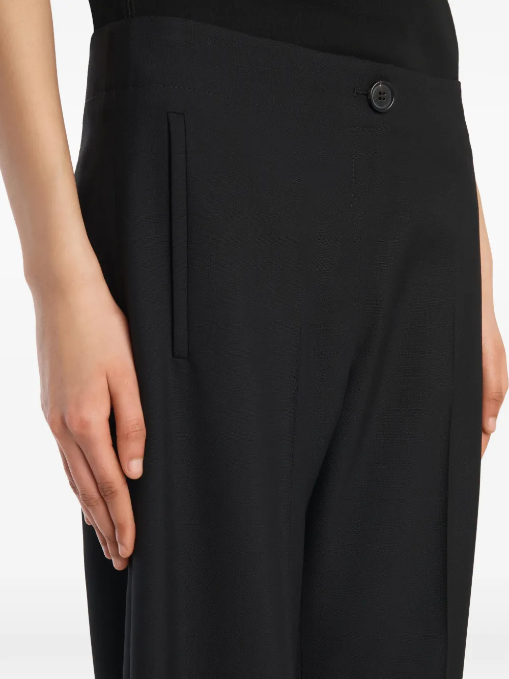 KHAITE Mita broek in zwarte wol